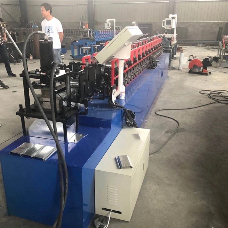 Hot in Peru Roller Shutter Door Roll Forming Machine 4 d9c1c237fa936a3312109f0cb38cd45c 1786098849