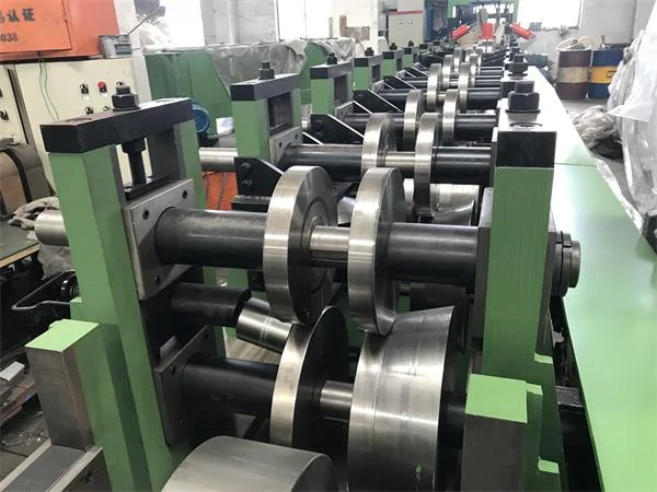 Standard heavy duty stock automatic interchange changeable slotted cz purlin roll forming machine 7 af08b150c3221b8a8a02d8b847cbabbf 1786088652 rWNt