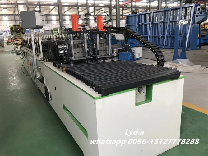 High Precision Door Shutter Roll Forming Machine With Punching 2 shutter door machine04 669x502 1786099049 VkmB