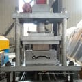 Metal shutter door rolling machine