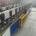 Roller shutter door frame forming machine