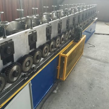 Roller shutter door frame forming machine