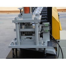 Roller shutter door forming machine with punching holes
